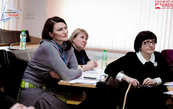 Photo 3: Participants. "Promoting the knowledge triangle in Moldova" listen to the presentations
